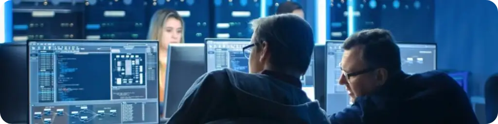 DevOps Team working in Office with Alert Management Software